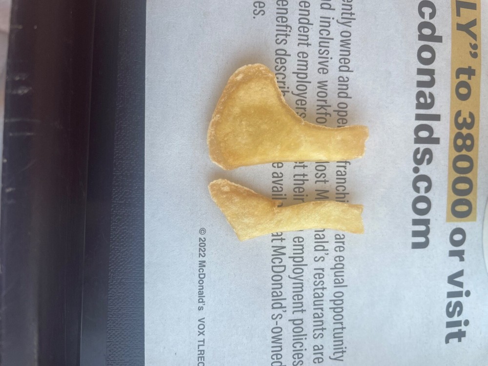 french fries shaped like feet that a child drew